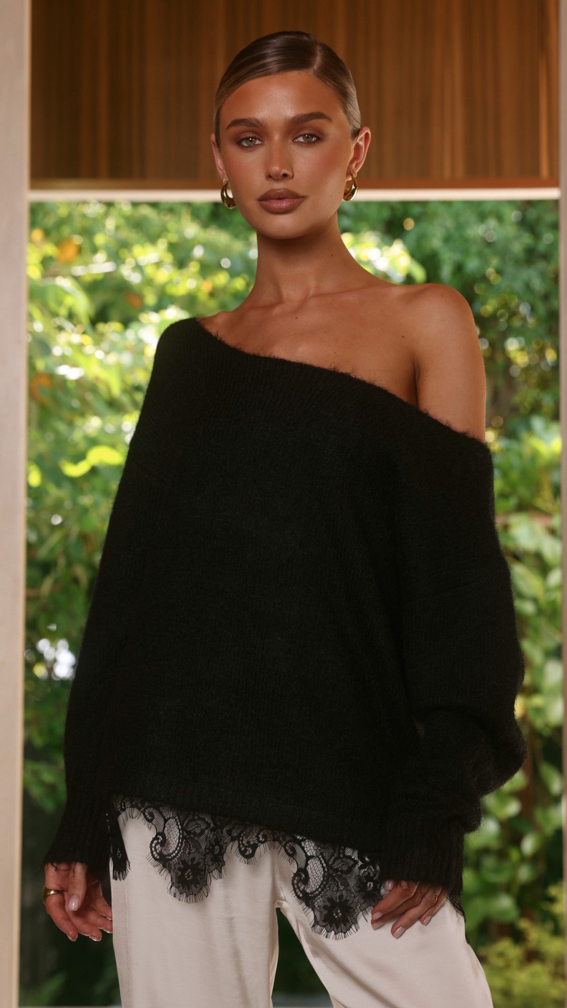 Lainey Asymmetric Off Shoulder Knit Top with Lace Hem – Black – view 1