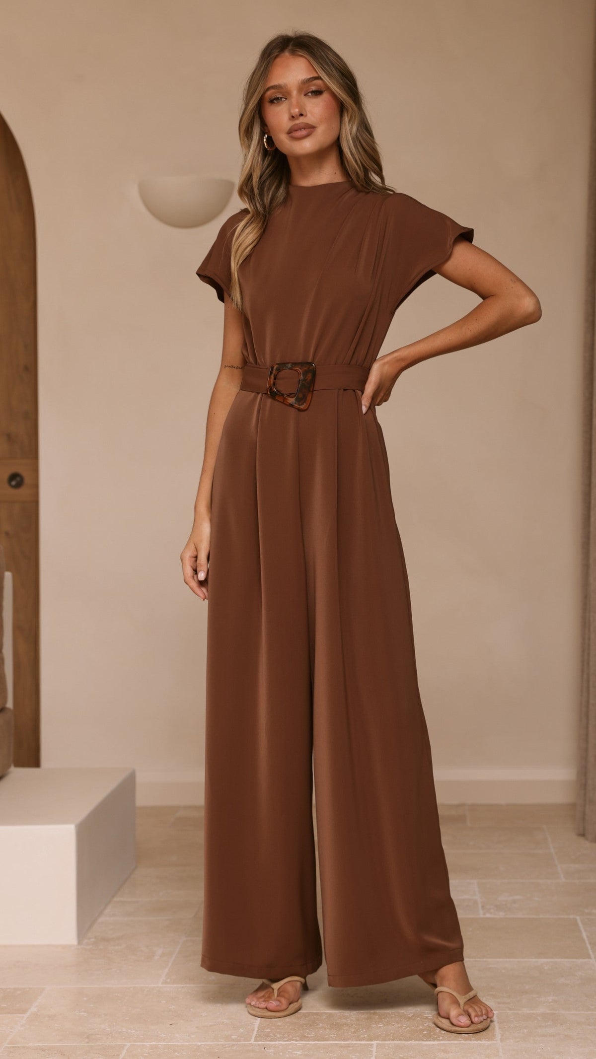 Demitra High Neck Cape Sleeve Jumpsuit with Tie Belt – Brown