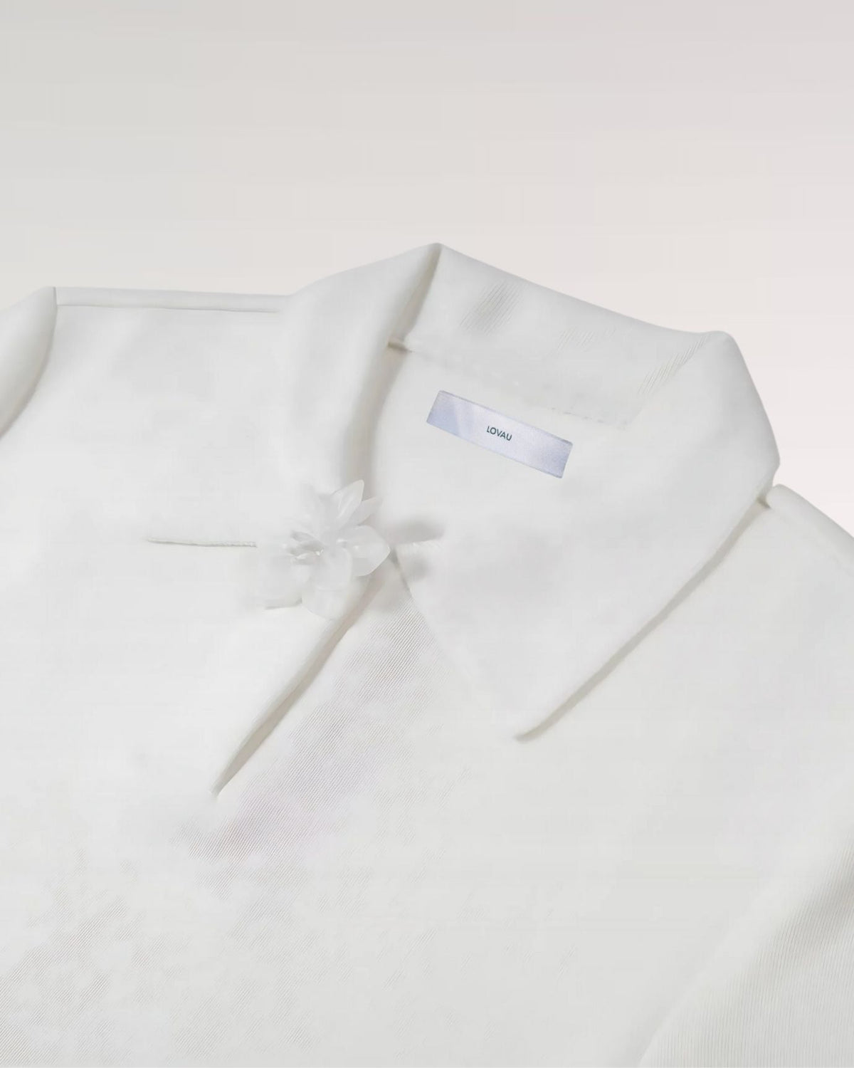 Textured Short Sleeve Polo Shirt with Flower Button Collar – White – view 4