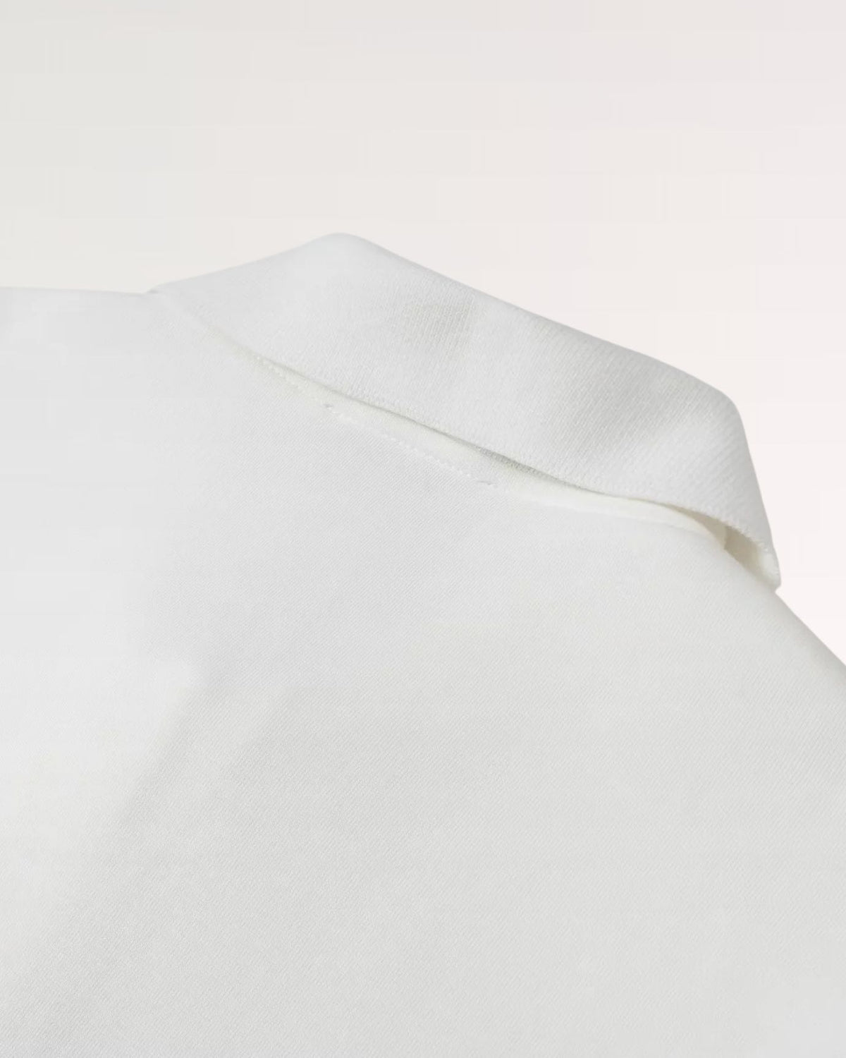 Textured Short Sleeve Polo Shirt with Flower Button Collar – White