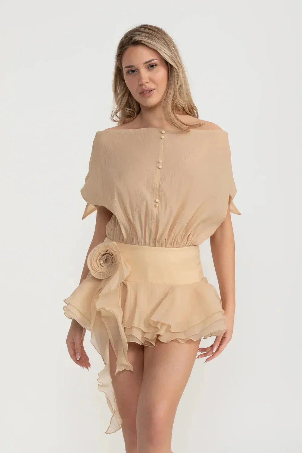 Strapless Draped Mini Dress with Peplum Hem and Rosette Waist – Beige