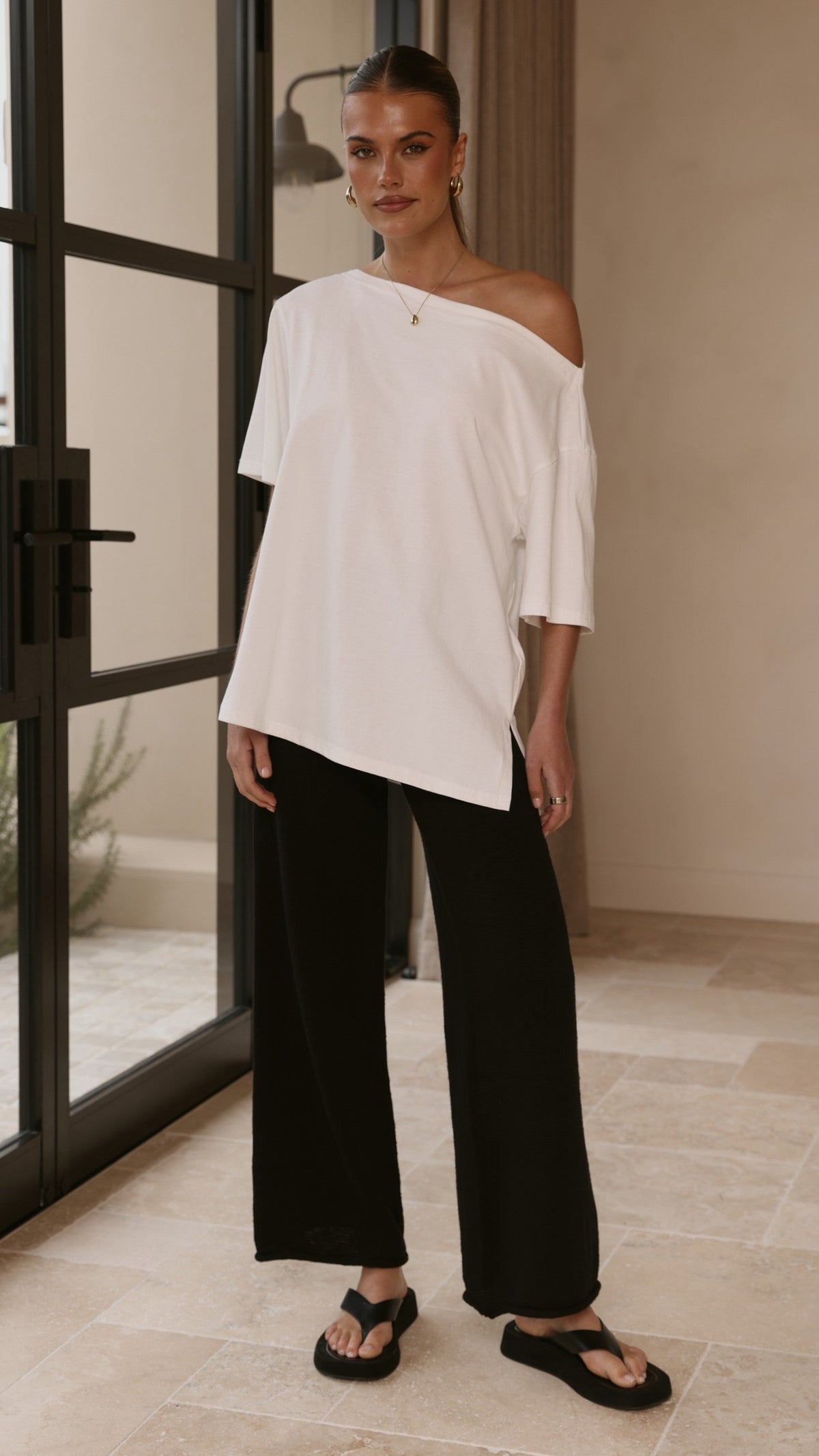 Cascadia Wide Leg Knit Trousers with Rolled Hem – Black – view 1