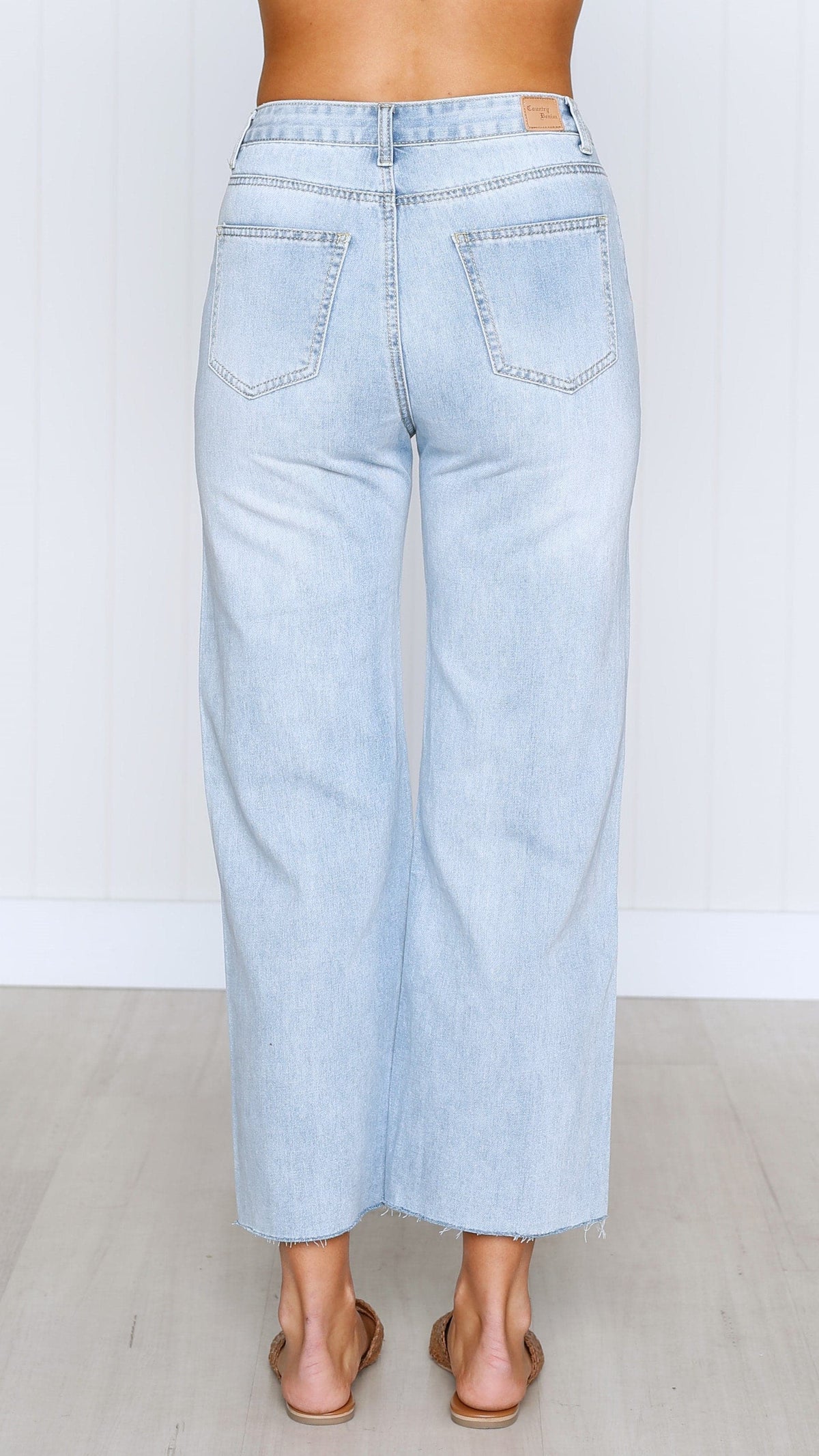 Jaykowa Mid Rise Wide Leg Jeans with Distressed Hem – Light Wash – view 26