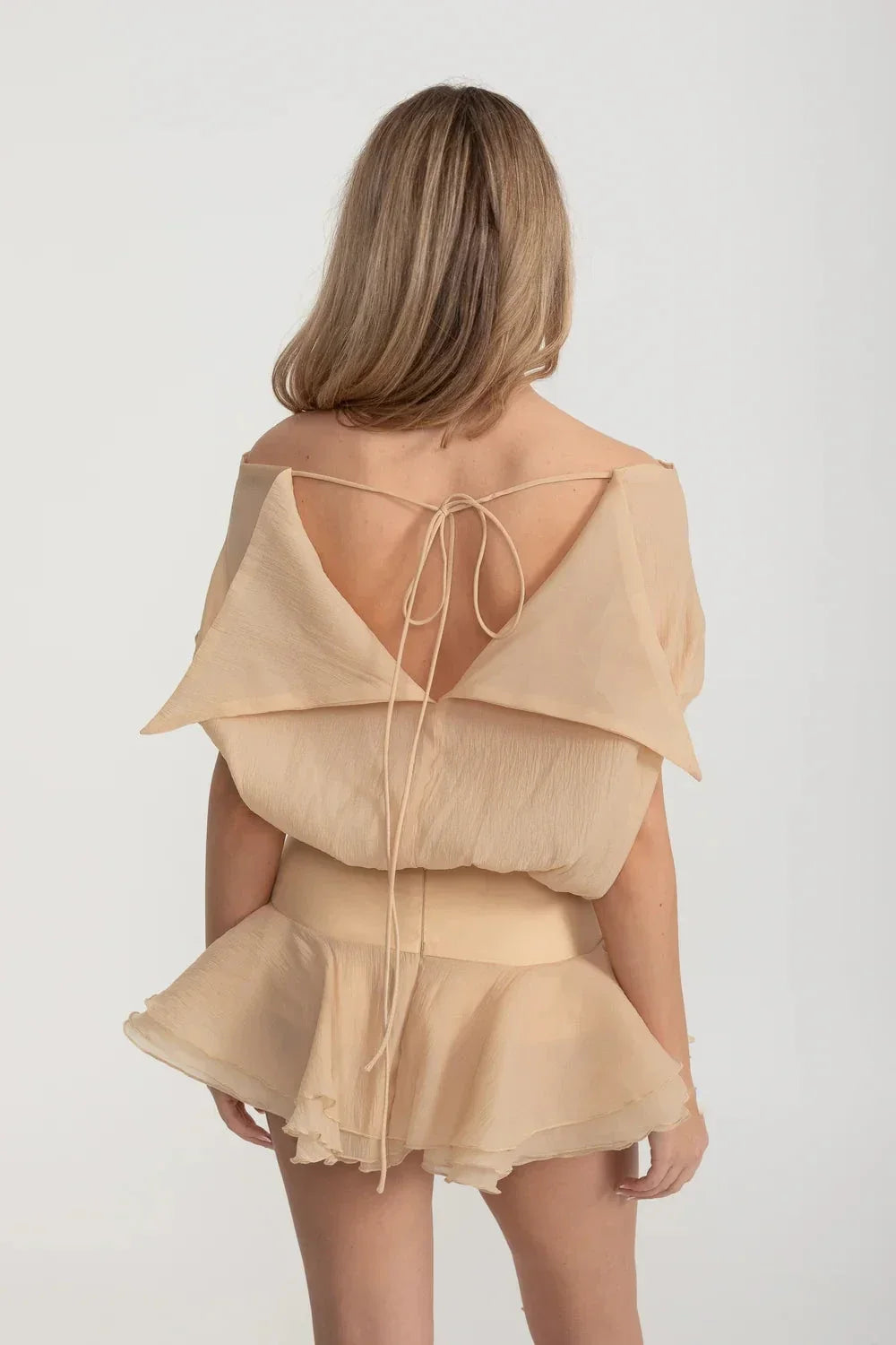 Strapless Draped Mini Dress with Peplum Hem and Rosette Waist – Beige – view 6