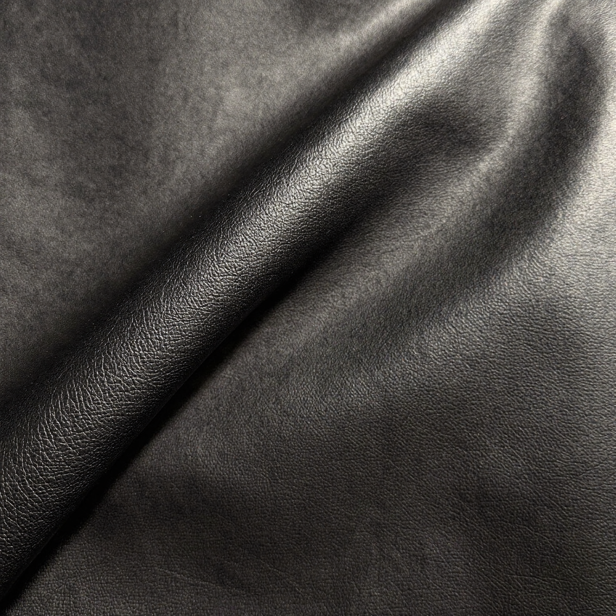 Black faux leather close-up