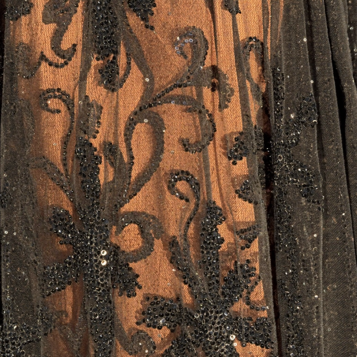 Black sequin fabric close-up