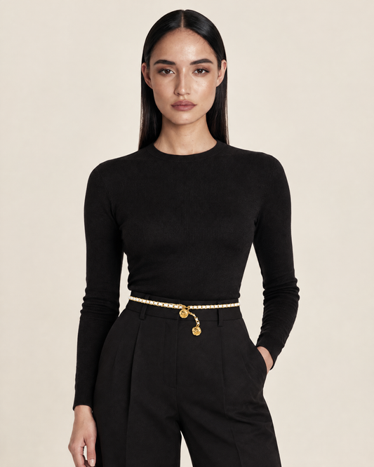 Skinny Vegan Leather Belt with Gold Pendant Detail – White worn by model