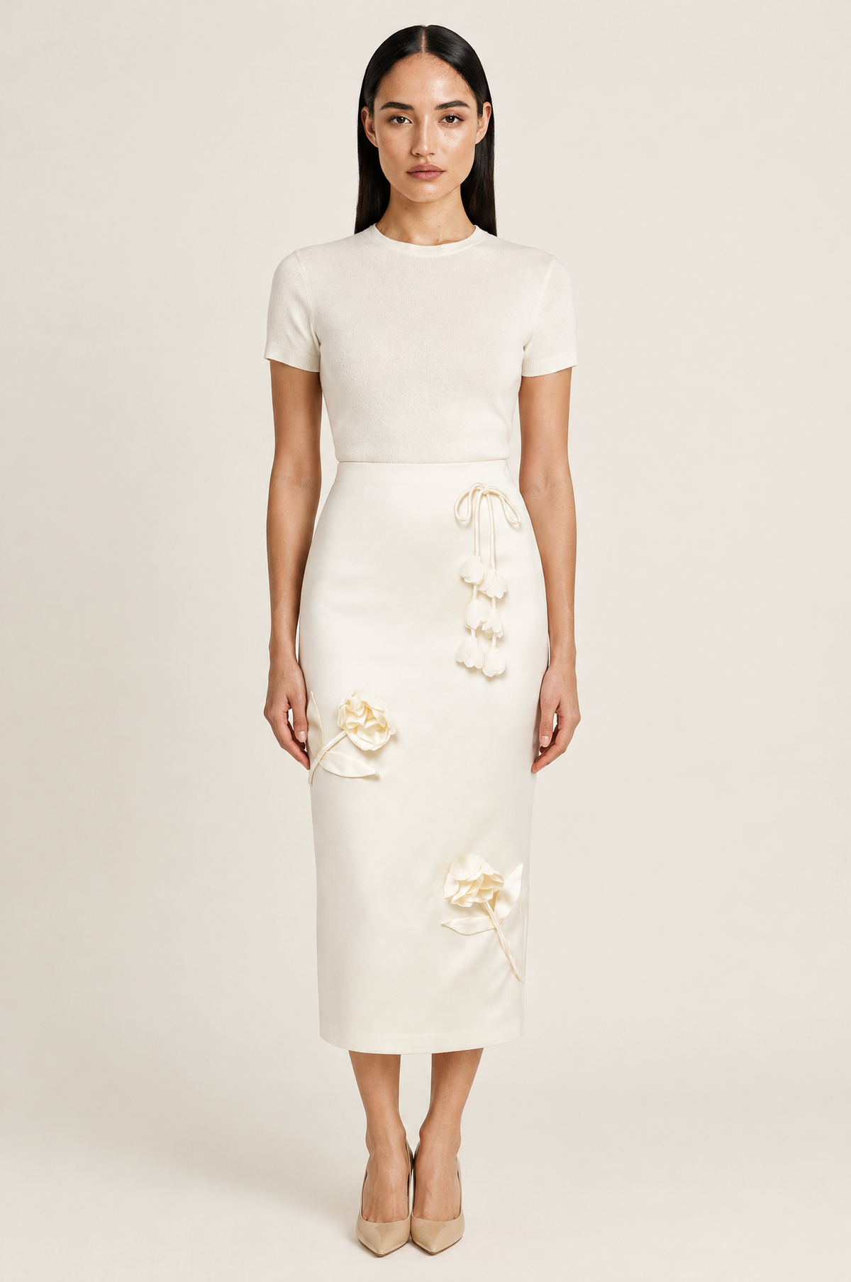 Satin Midi Pencil Skirt with 3D Floral Appliqués – Ivoire worn by model