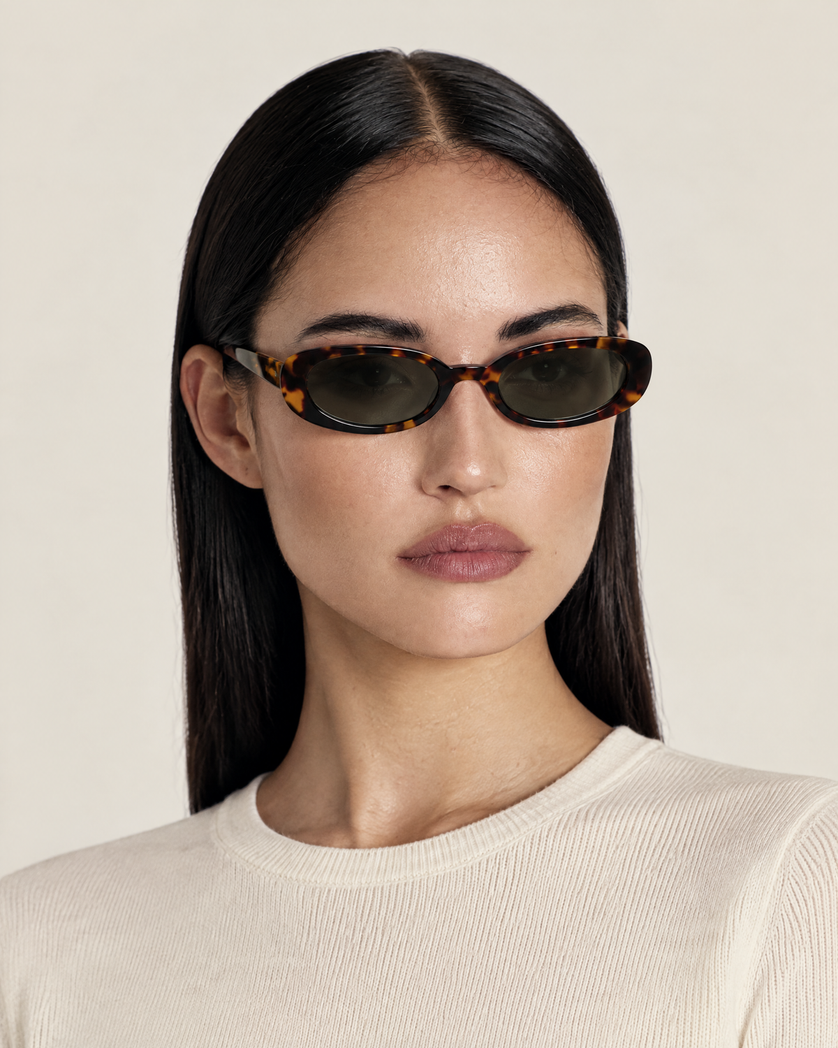 Lana Slim Oval Acetate Sunglasses – Tortoiseshell Green worn by model