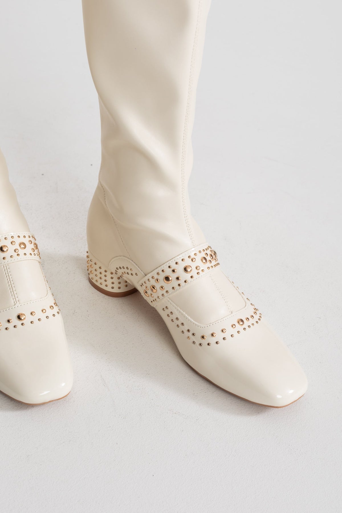 Studded Patent Knee-High Boots with Adjustable Strap – Ivory – view 2