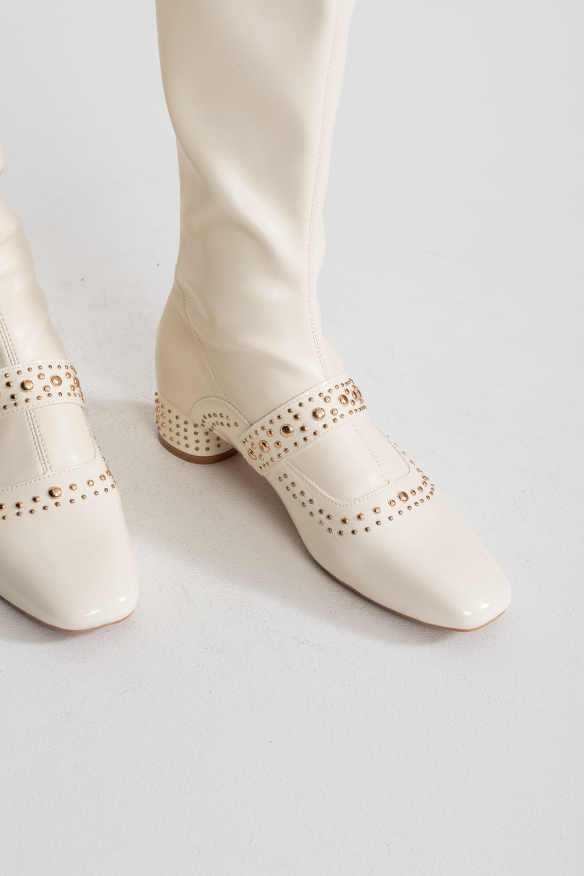 Studded Patent Knee-High Boots with Adjustable Strap – Ivory – view 3