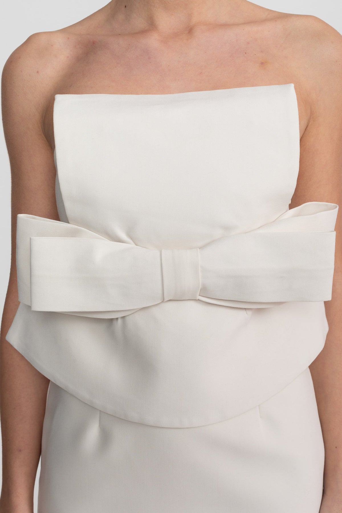 Strapless Bandeau Mini Dress with Oversized Bow and Peplum Overlay – White – view 6