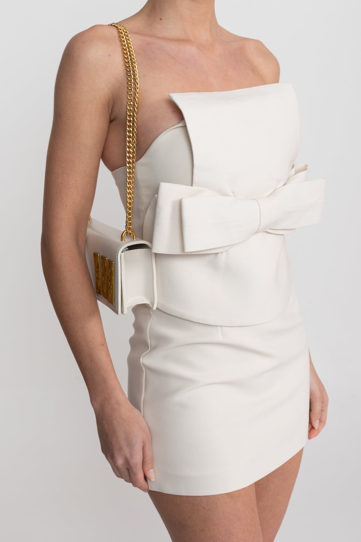 Strapless Bandeau Mini Dress with Oversized Bow and Peplum Overlay – White – view 9