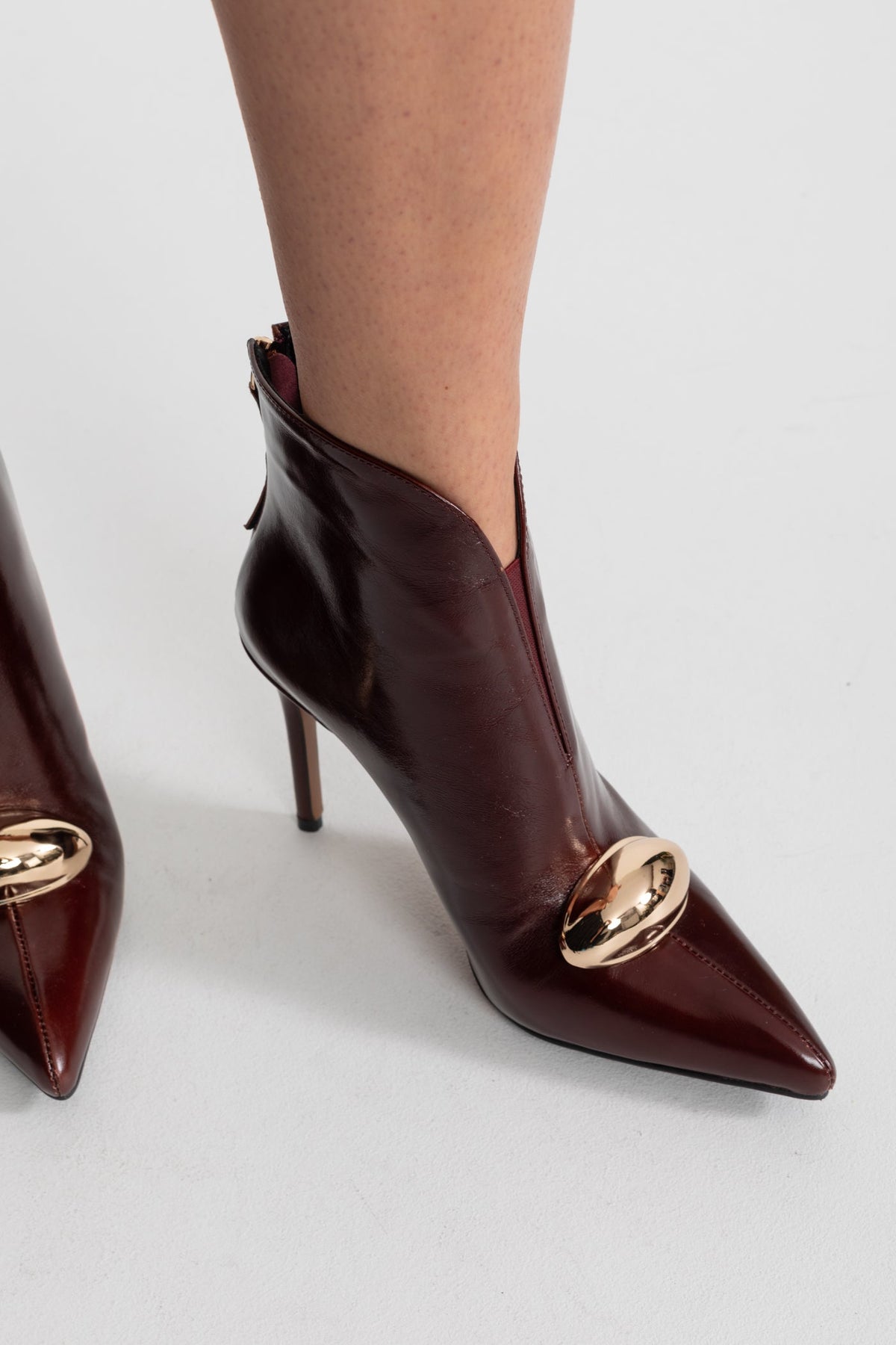 Leather Pointed Toe Ankle Boots with Gold Buckle Detail – Burgundy
