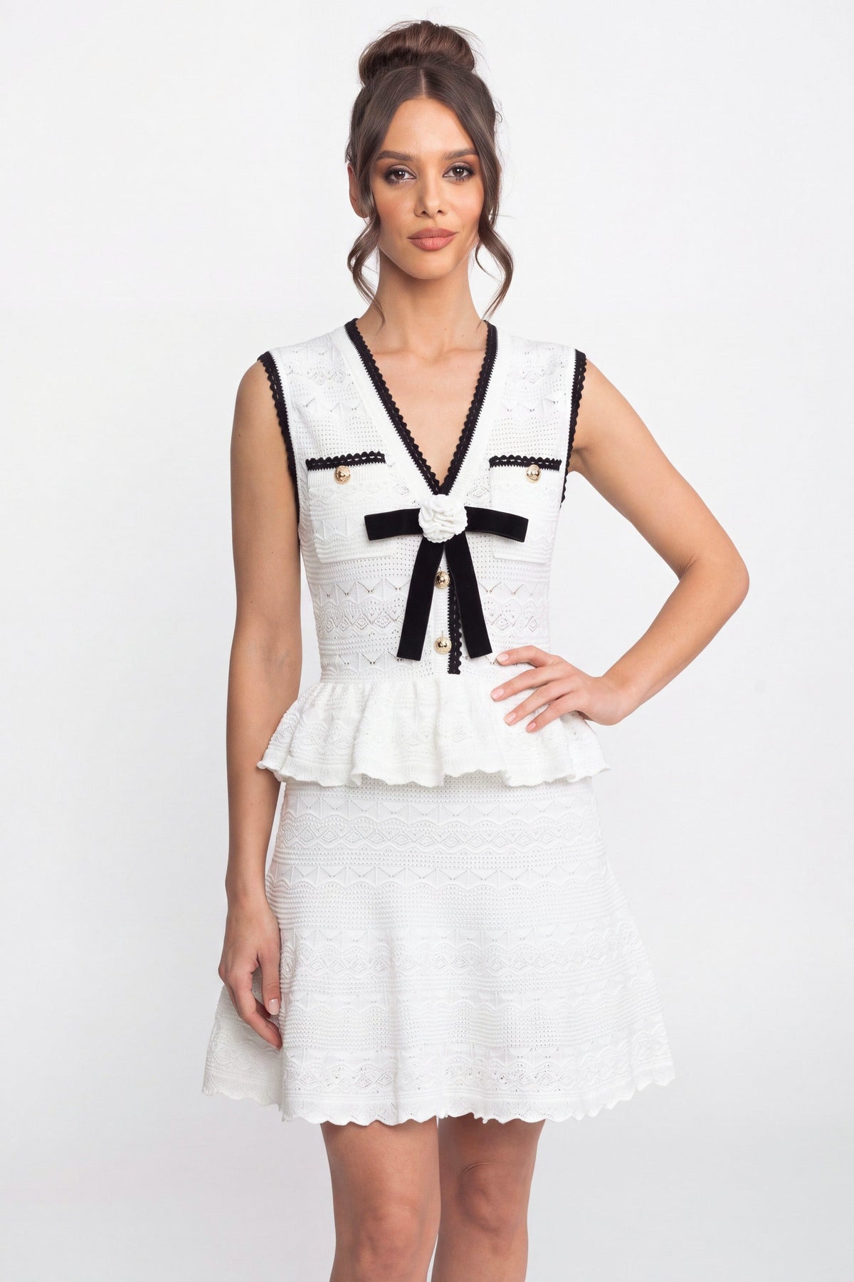 Sleeveless Knit Peplum Mini Dress with Contrast Trim and Bow – White – view 1